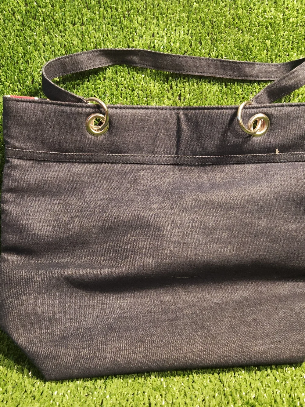 Tommy Hilfiger Black Canvas Tote with Gold-Tone Grommets